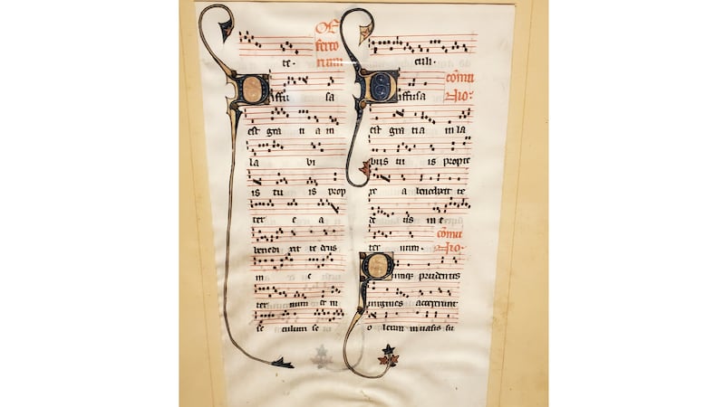 This photo provided by Will Sideri shows a 700-year-old manuscript that was used in the...