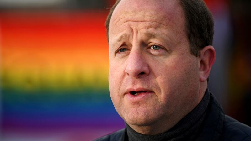 Colorado Gov. Jared Polis speaks at a memorial set up outside Club Q in Colorado Springs,...