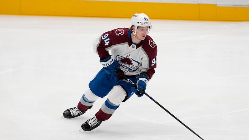 Colorado Avalanche center Joel Kiviranta controls the puck during a preseason NHL hockey game...
